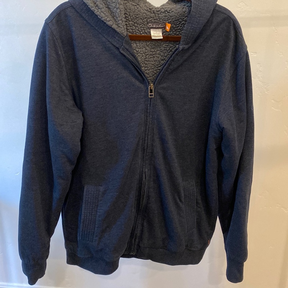 Quiksilver zip up fleece hoodie, size L. Navy blue and grey fleece inside.